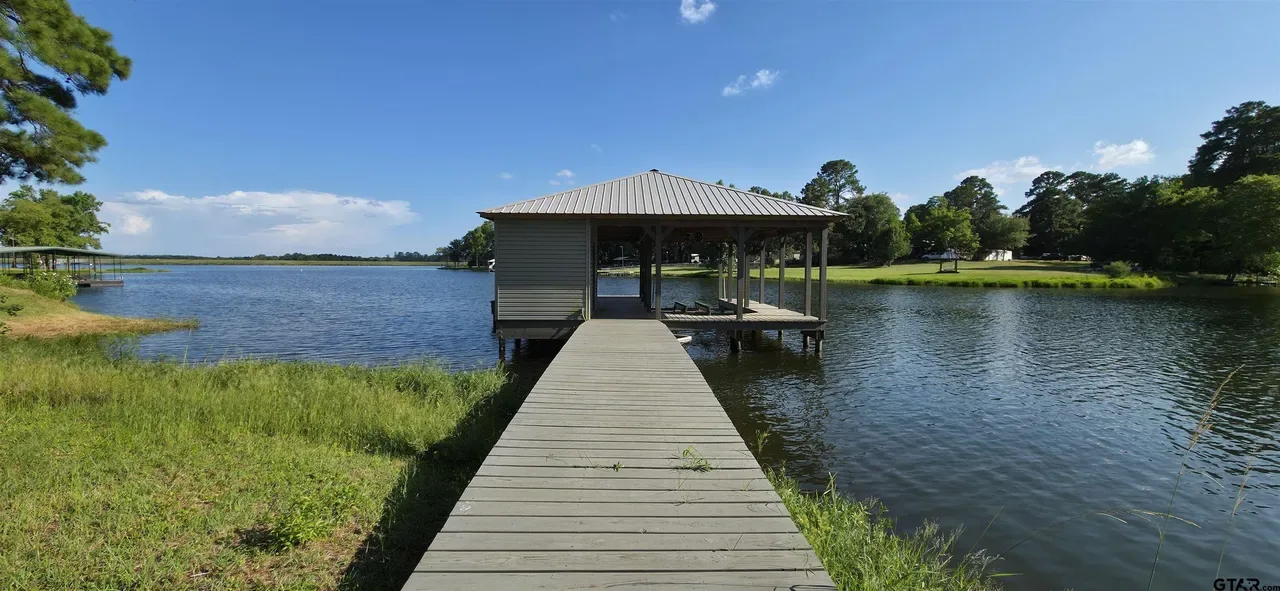 Preview of the video tour: the dock and covered boathouse at 644 An County Road 3009 on Lake Palestine in Frankston TX