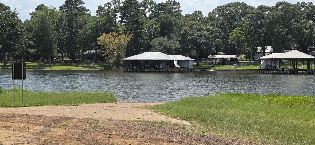 The residents' boat ramp at The Meadows looking across Lake Palestine to the neighborhood boathouses.