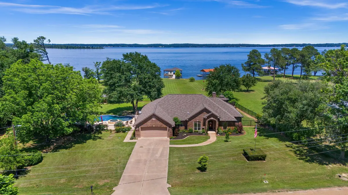 Lake Palestine luxury waterfront home aerial view Chandler TX